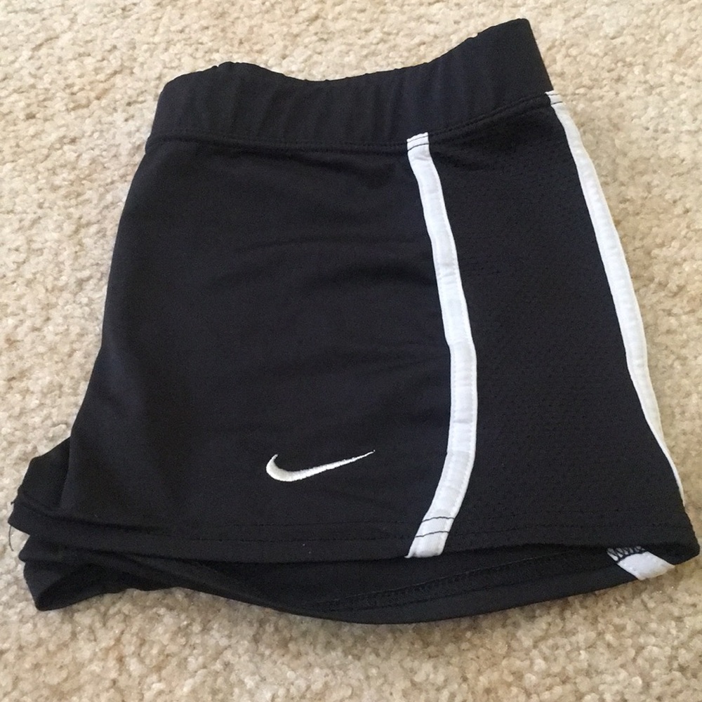 A pair of black and white nike pros